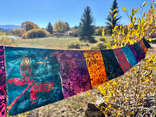 Dragonfly and floral themed wall hanging