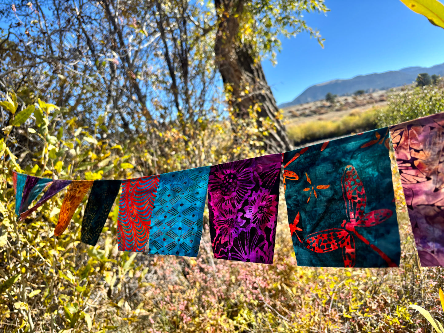 Dragonfly and floral themed wall hanging